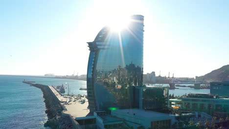 Luxury-hotel-in-Barcelona-aerial-view-sunny-day-Spain-mediterranean-sea